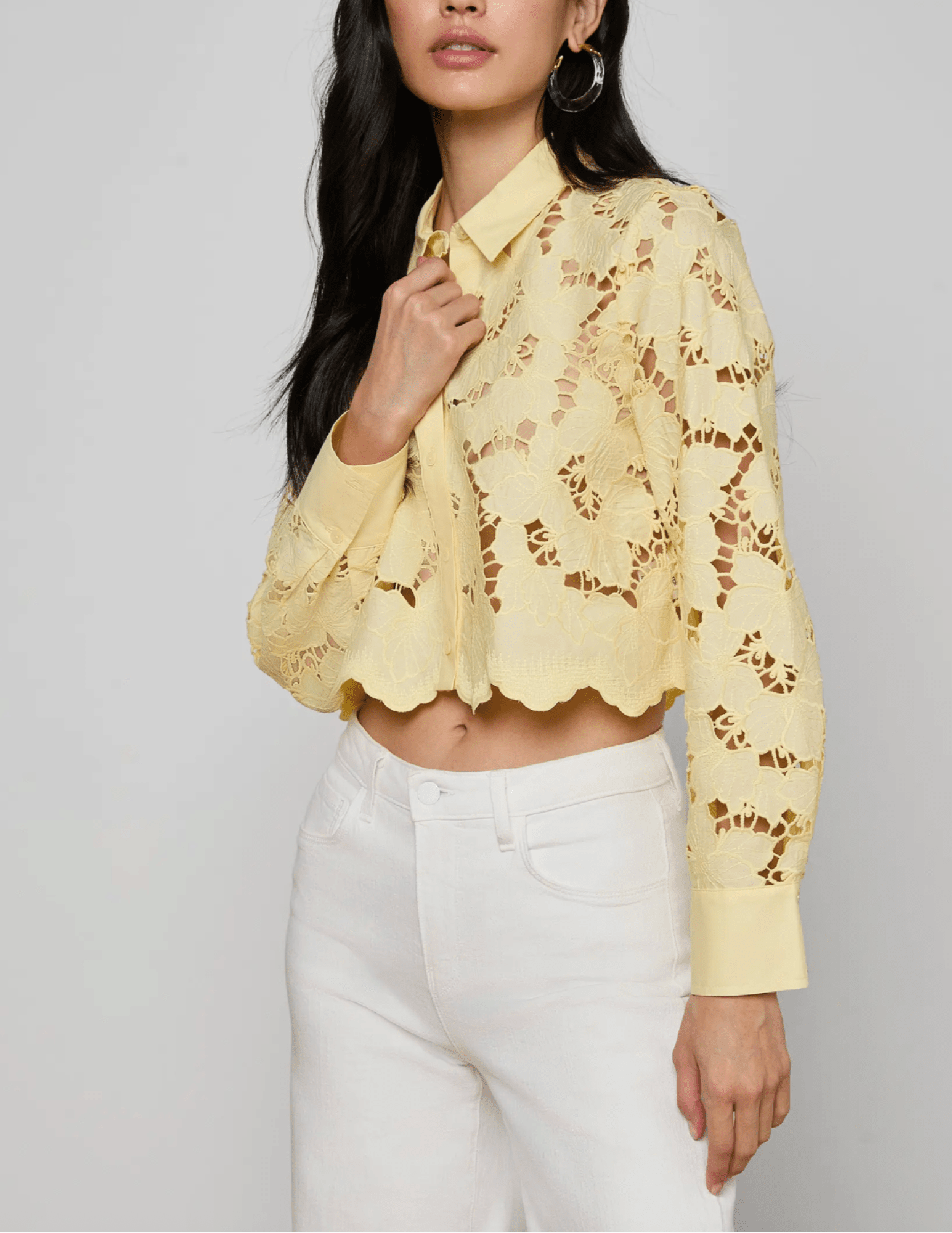 Side view of L'Agence Seychelle lace cropped blouse in lemon sorbet