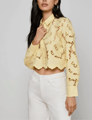 Side view of L'Agence Seychelle lace cropped blouse in lemon sorbet