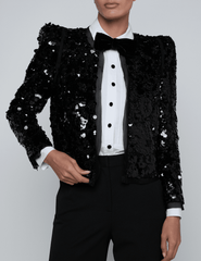 Front view of L’AGENCE Shai Sequin Pointed Shoulder Jacket in black sequins.
