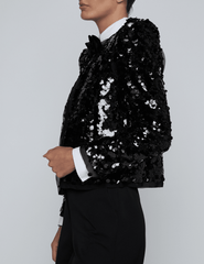 Side view of L’AGENCE Shai Sequin Pointed Shoulder Jacket in black sequins.