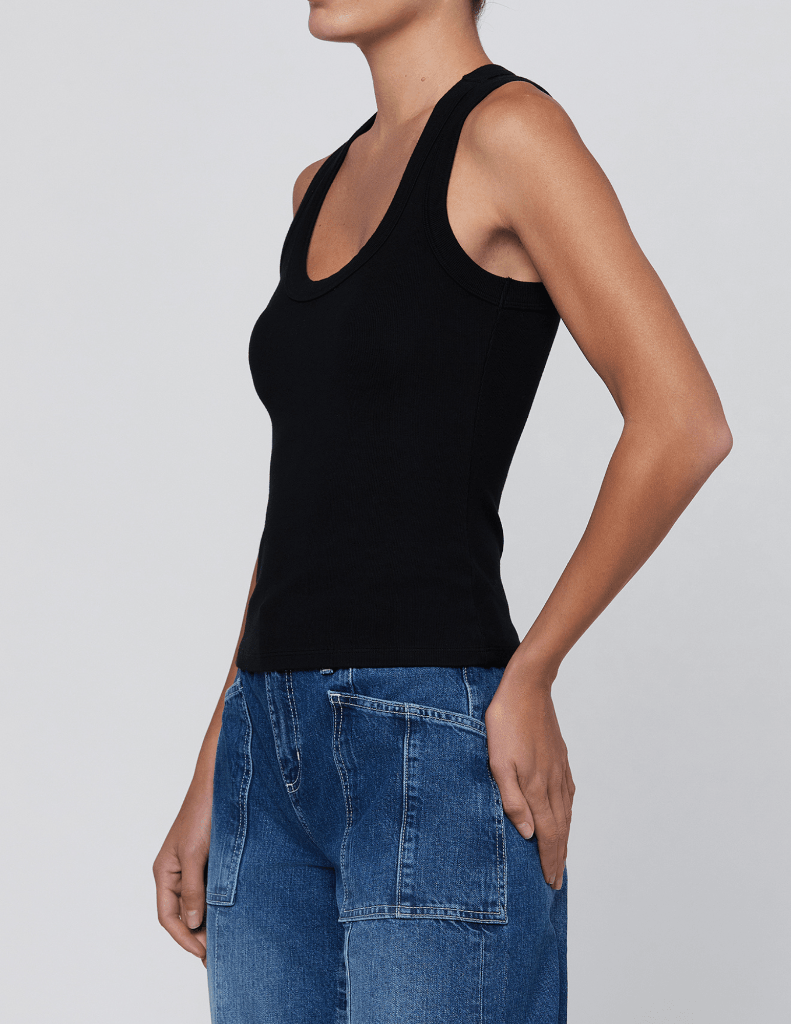 Side view of L'AGENCE Shania Racerback Tank in Black