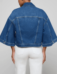 Back view of L'AGENCE Silas Cape Denim Jacket in Orwood
