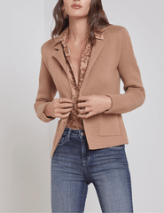 Model wearing L’AGENCE Sofia Knit Blazer in ginger snap with casual denim and blouse