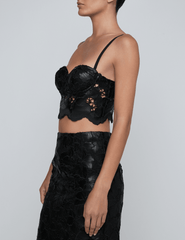 Side view of L’AGENCE Sonya black vegan leather lace bustier