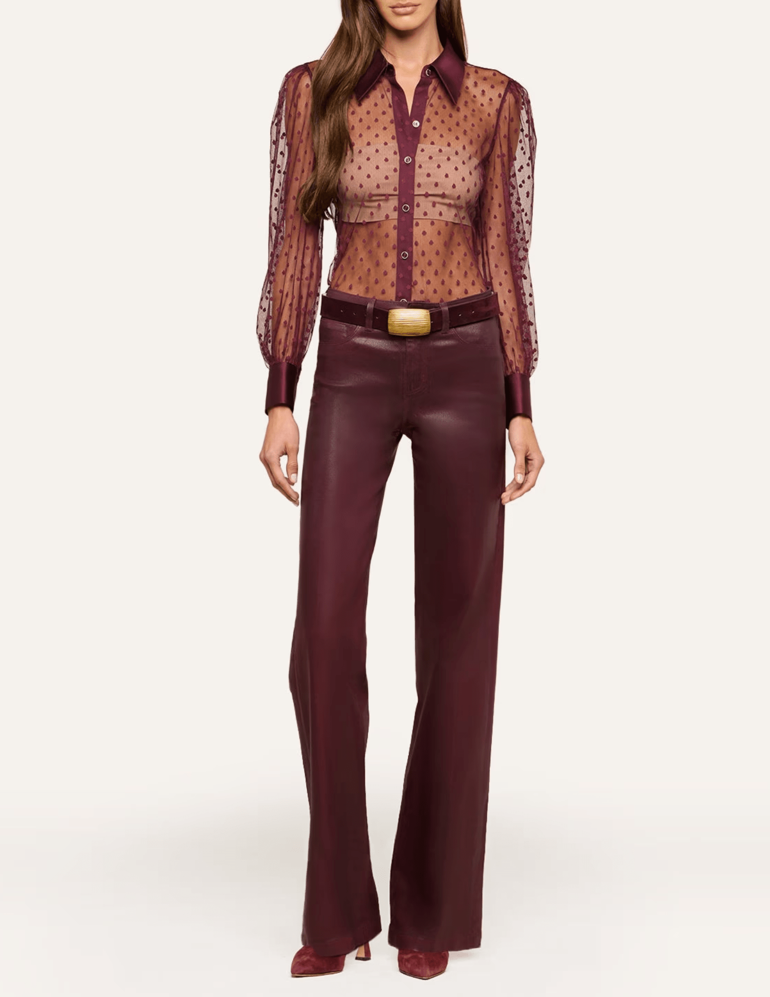 L'AGENCE Sophie Swiss Dot Blouse styled with burgundy leather trousers for a sophisticated evening outfit.