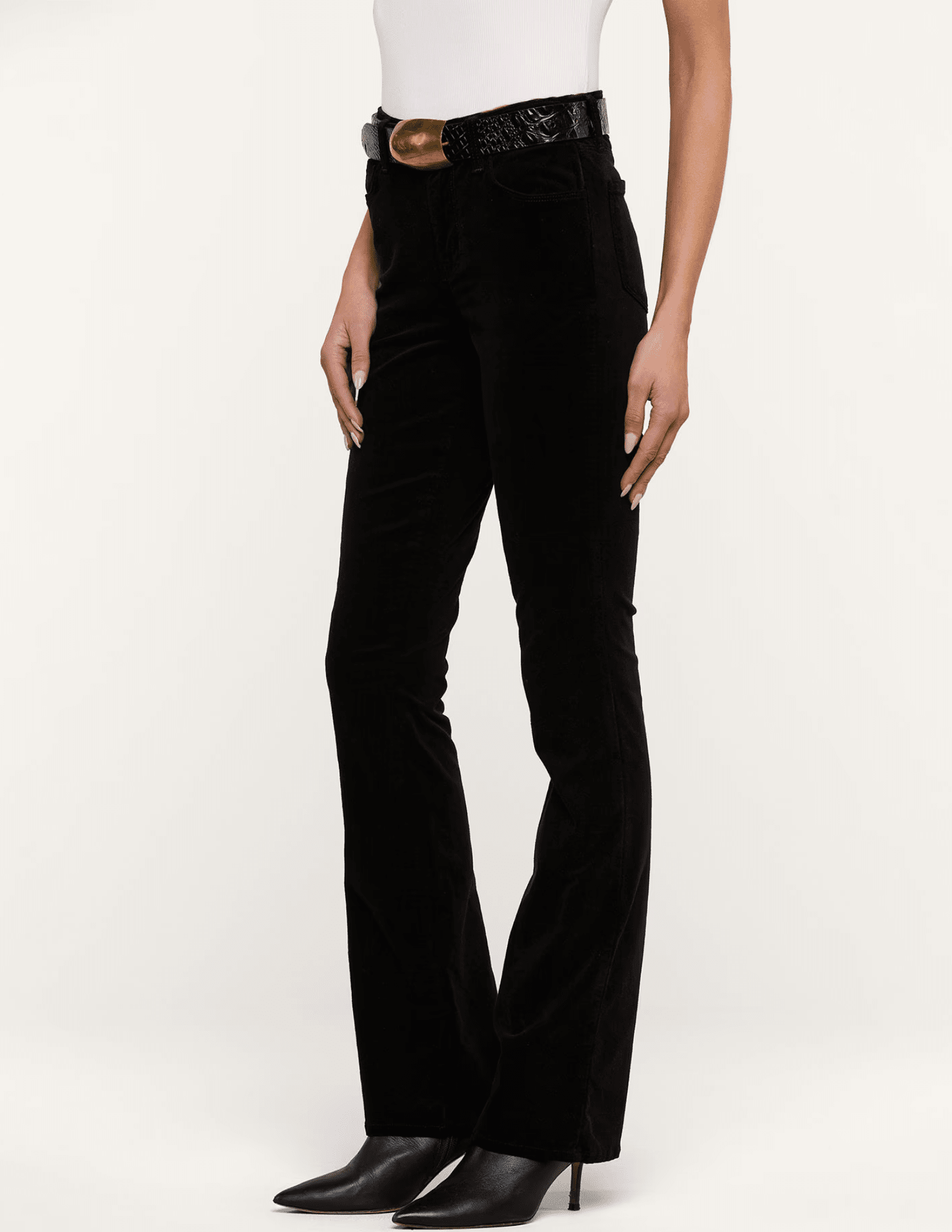 Side view of L'AGENCE Stevie Velvet Jean in Noir showing sleek straight-leg fit