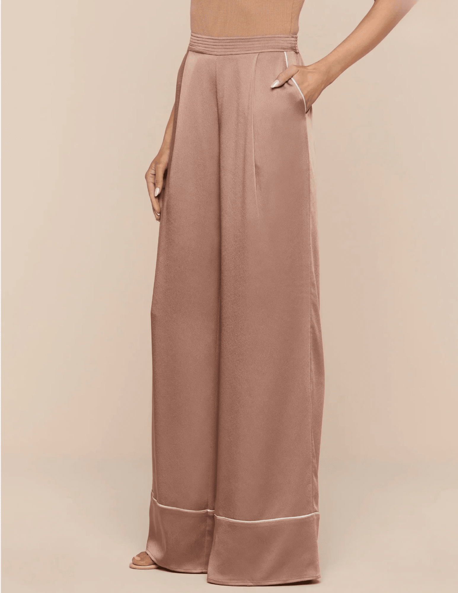Side view of high-rise satin wide leg pants with piping