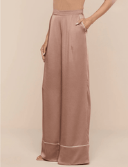 Side view of high-rise satin wide leg pants with piping