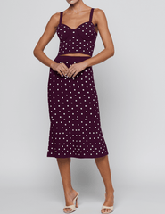 L'AGENCE Tula Knit Bra Top styled with the matching Mae Knit Flare Skirt.