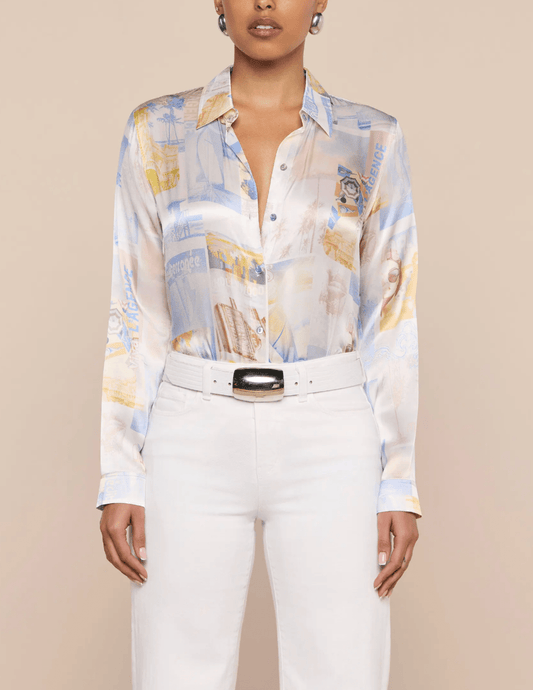 Model wearing L'AGENCE Tyler Malibu Post Card silk blouse