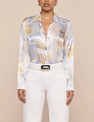 Model wearing L'AGENCE Tyler Malibu Post Card silk blouse