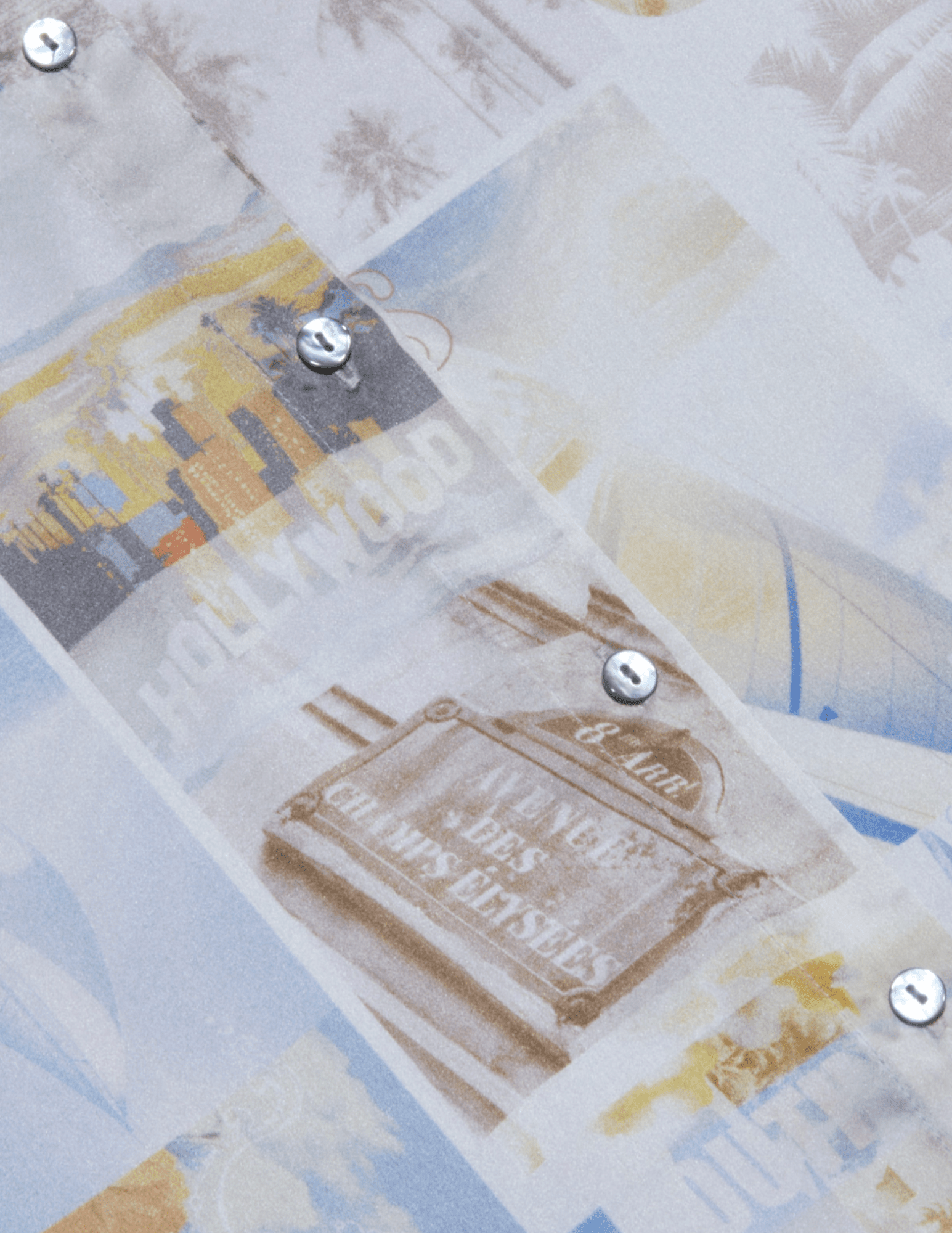 Close-up of the Malibu postcard print on the L'AGENCE Tyler silk blouse