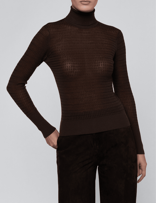 Model wearing L'AGENCE Umbra dark brown lightweight wool turtleneck with slim-fitting silhouette