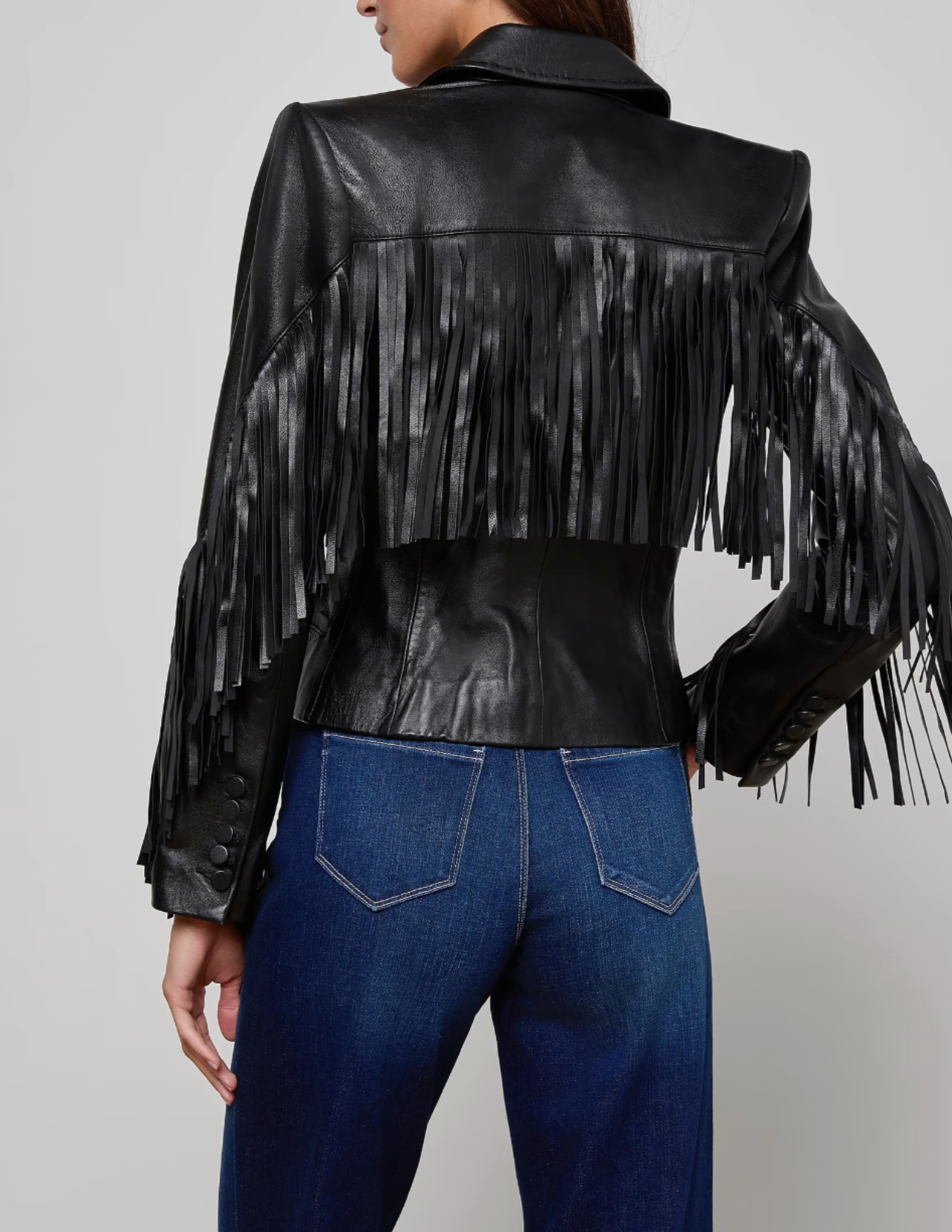 Back view of L’AGENCE Vashti Black Leather Blazer featuring fringe detail