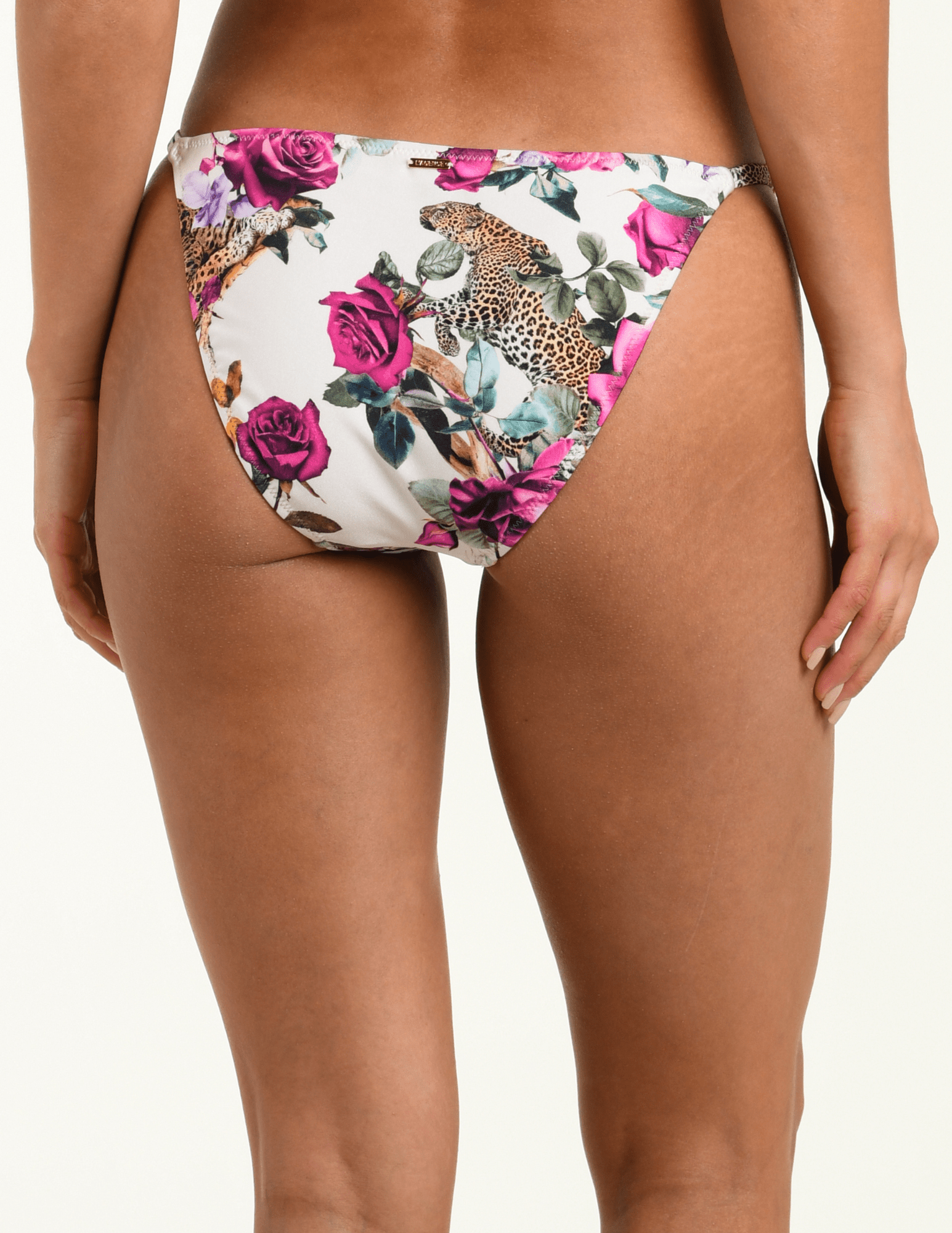 Back view of L’AGENCE Violet string bikini bottom in Rose Leopard Jungle