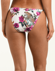 Back view of L’AGENCE Violet string bikini bottom in Rose Leopard Jungle