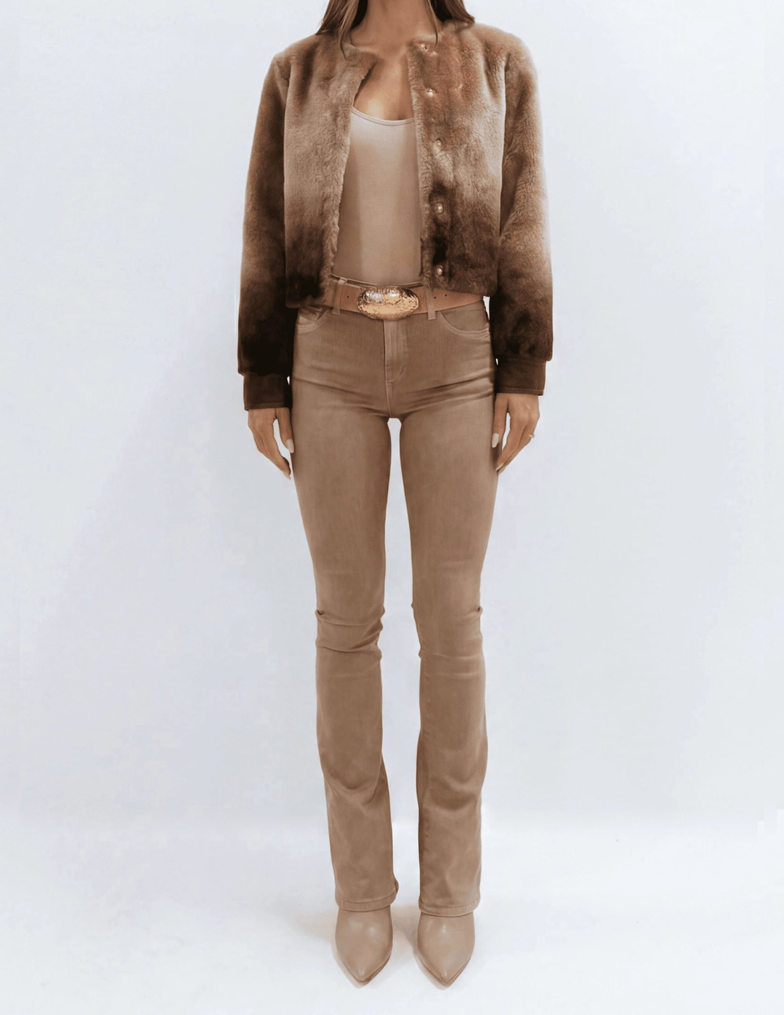 Model wearing the L'AGENCE Voltaire brown ombre shearling jacket with tonal brown pants.