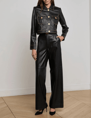 Model styling the L’AGENCE Winsome black studded leather jacket with pants