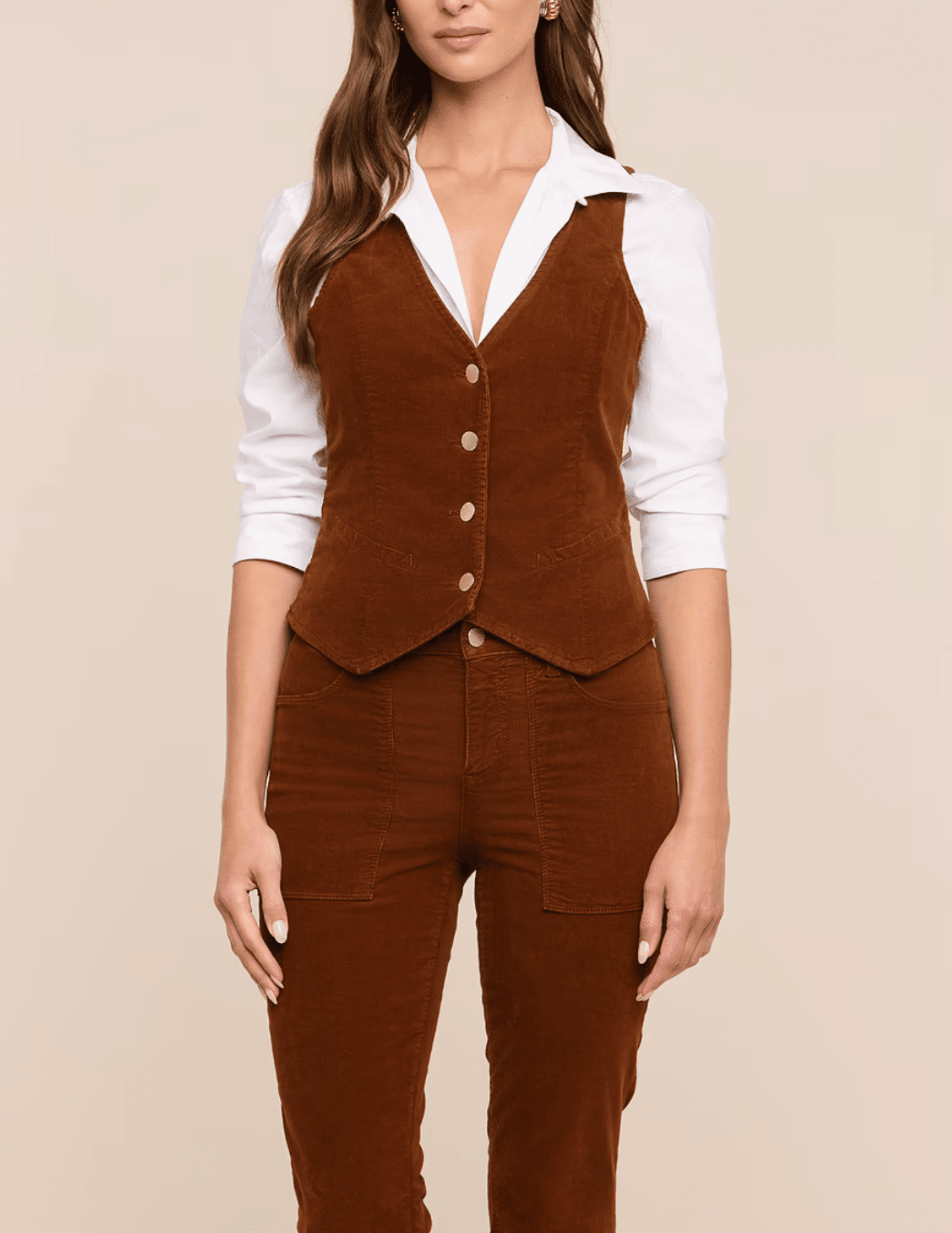 Front view of L'AGENCE Yelena Corduroy Vest in Java layered over white shirt