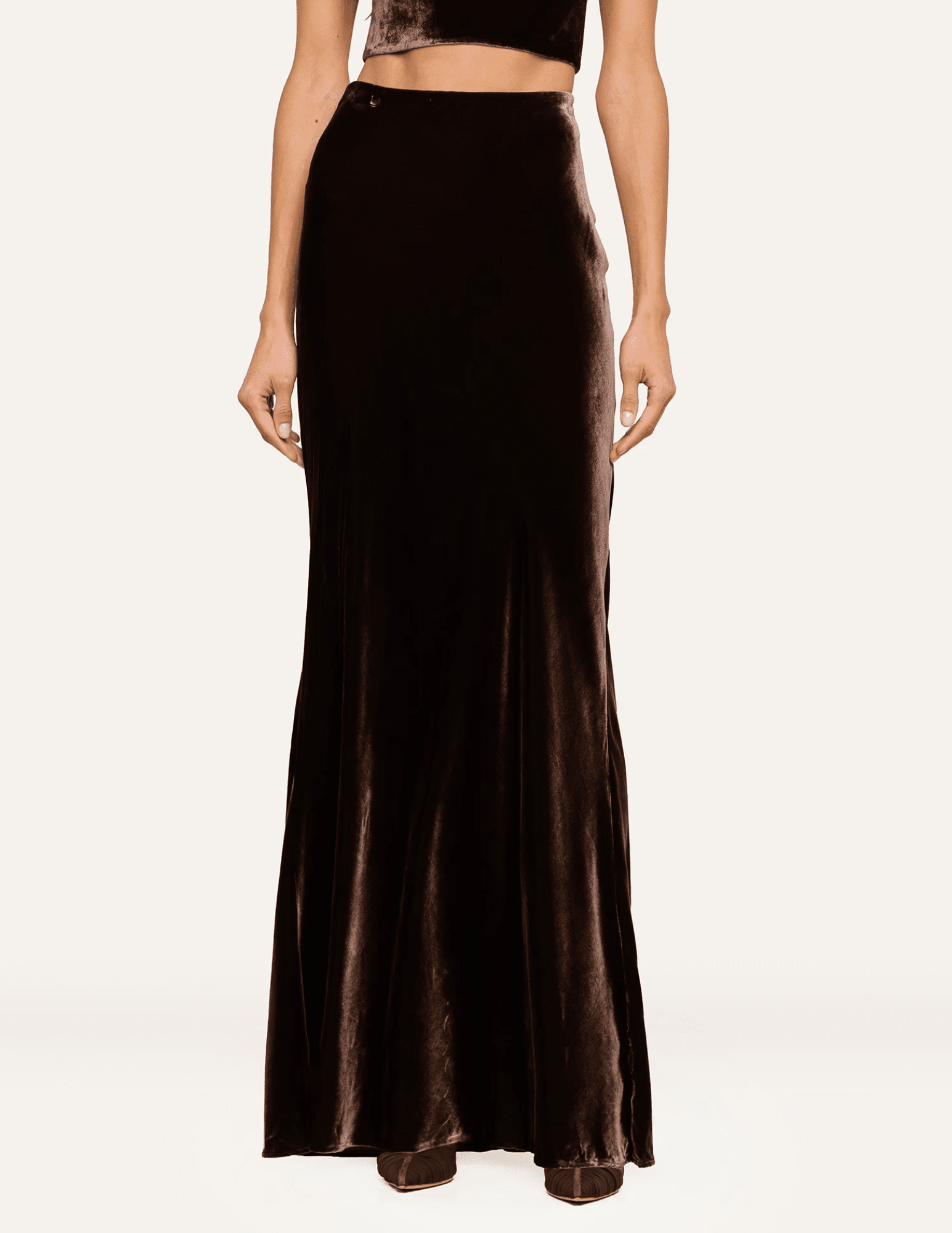 Front view of L'AGENCE Zeta Velvet Maxi Skirt in Dark Java featuring a flattering high waist and flowing velvet fabric.