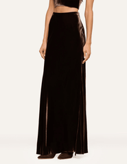 Side view of L'AGENCE Zeta Velvet Maxi Skirt in Dark Java featuring a sleek floor-length silhouette.