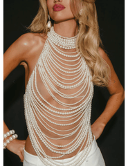 Luxury designer pearl halter top styled for evening wear