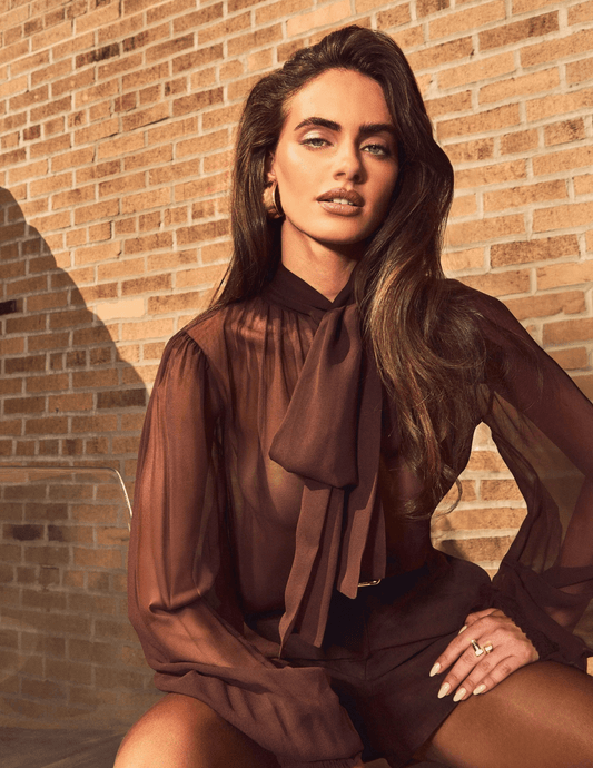 Lifestyle image of Retrofête Hasli Silk Chiffon Blouse in Mahogany