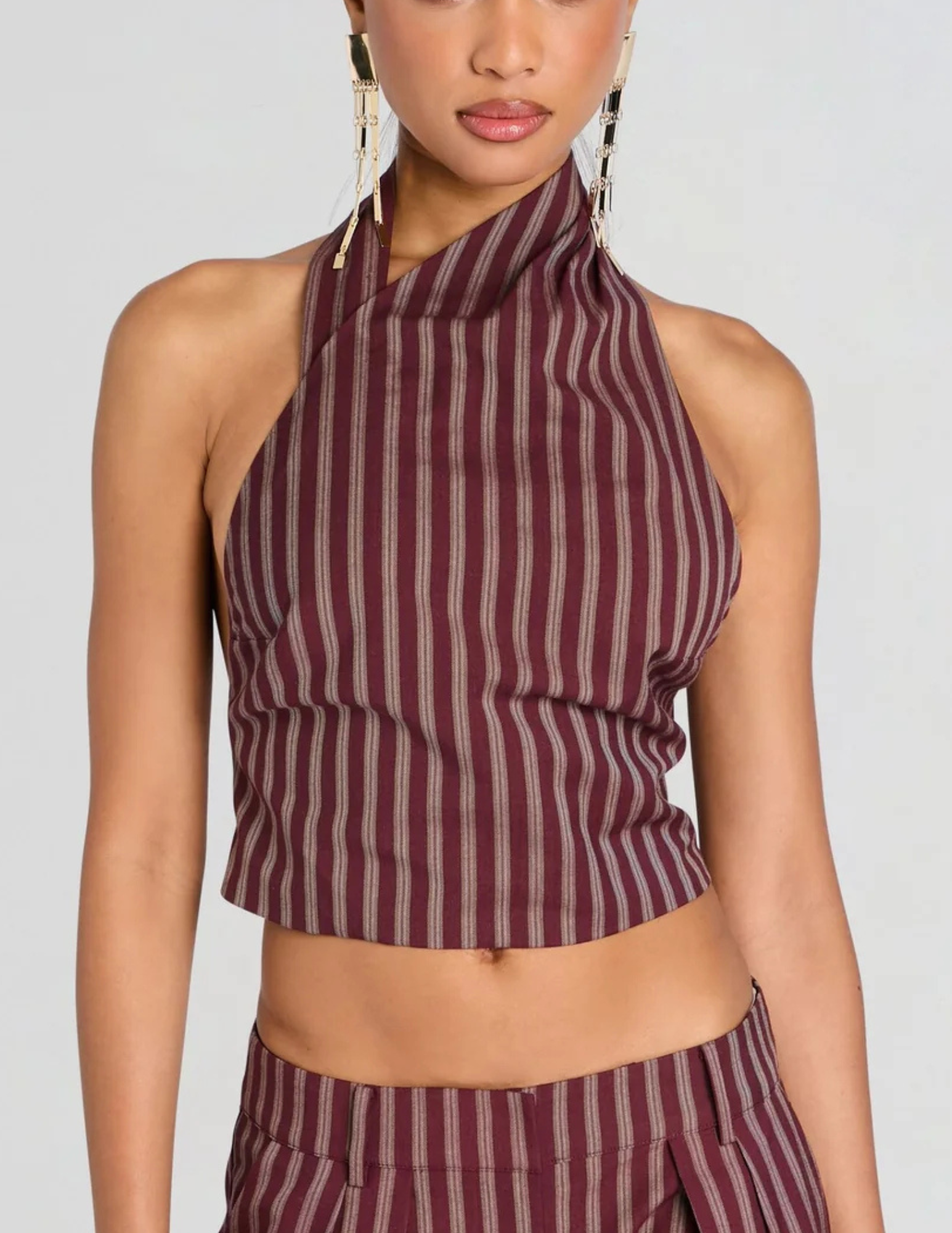 Frot view of Retrofête Velora Halter Top in Cigar Pinstripe