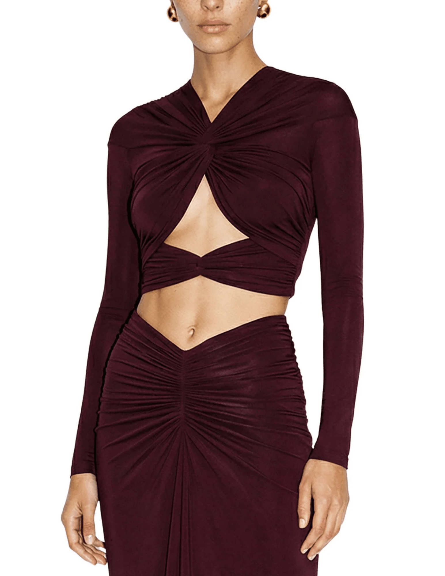 Front view of Ronny Kobo Bebe long sleeve crop top in Truffle styled with a matching maxi skirt.