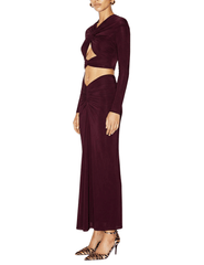 Side view of Ronny Kobo Brogan Midi Skirt showing its slim silhouette and draped jersey fabric.