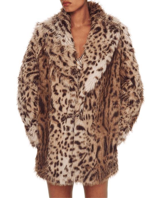 Model wearing Ronny Kobo Declan leopard-print faux fur coat with relaxed mid-thigh silhouette