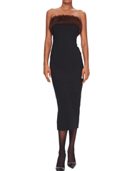 Model wearing Ronny Kobo Harli black strapless midi dress with plush brown faux fur trim