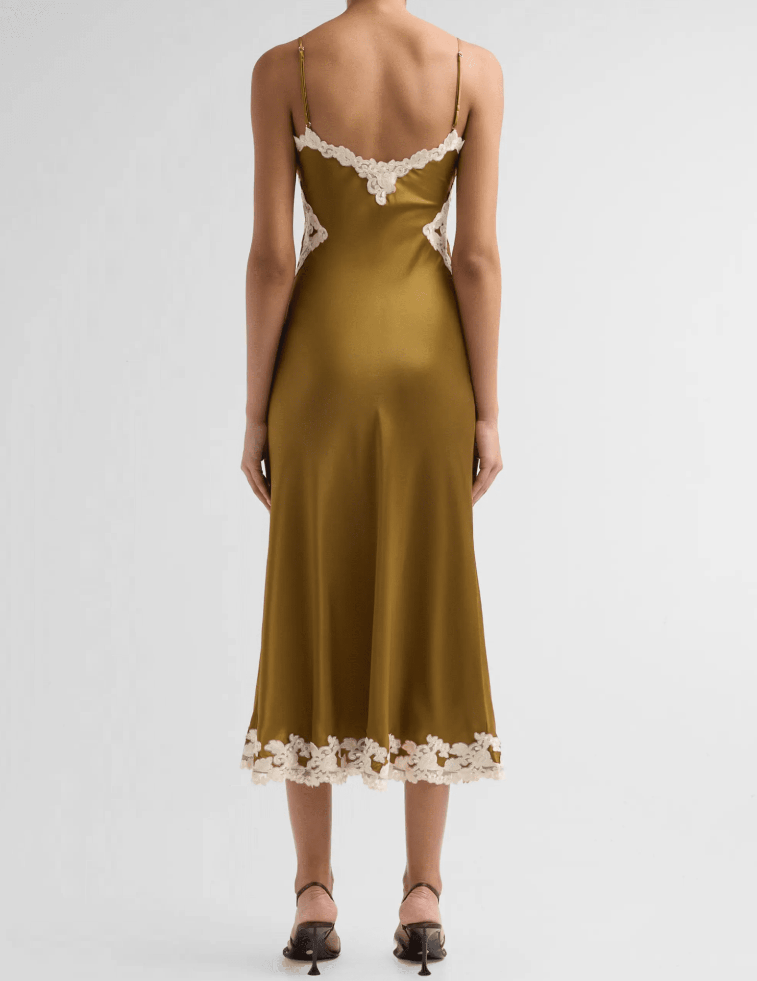 Back view of Ronny Kobo Lalita Midi Dress in Ochre showcasing adjustable straps and a fluid silk silhouette.