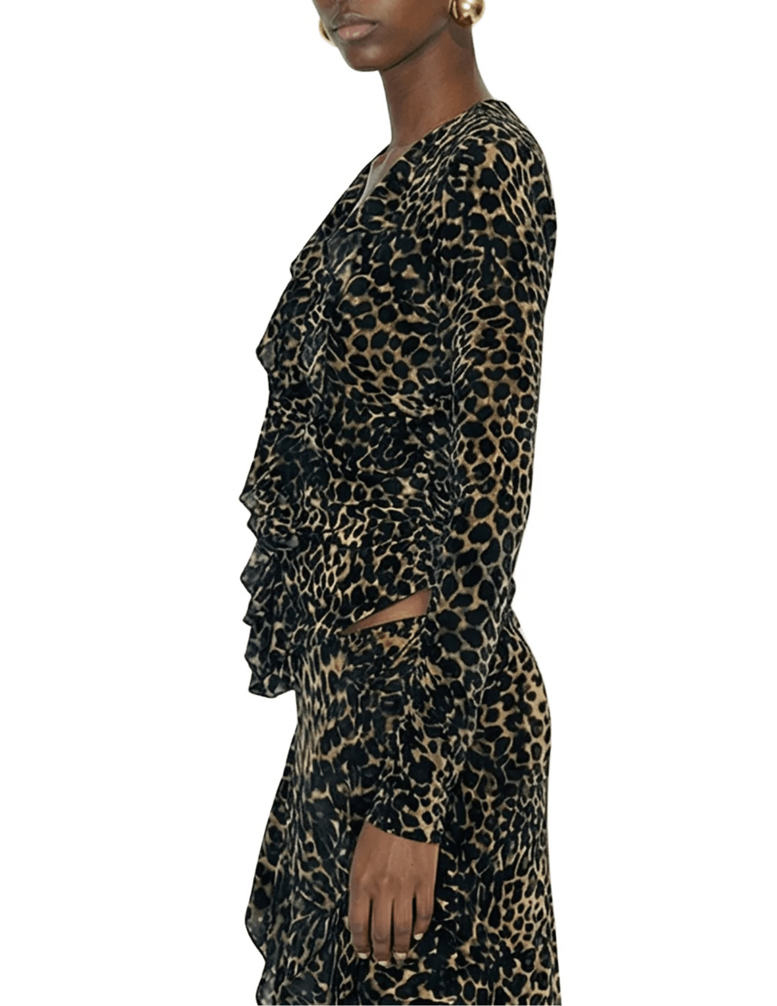 Side view of Ronny Kobo Marian Velvet Ruffle Top showing its long sleeves and textured leopard print.