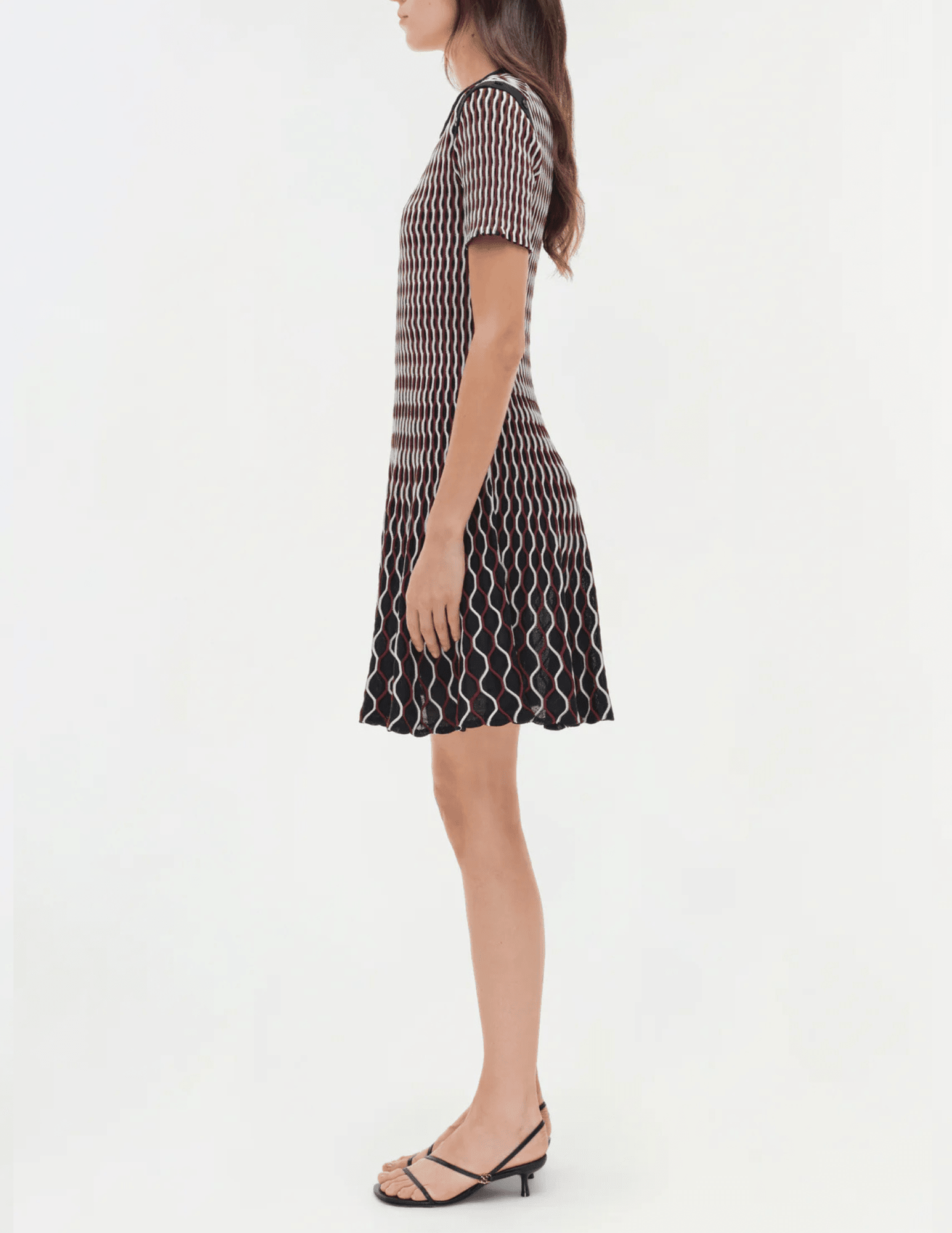 Simkhai Baylor Knit Mini Dress in cranberry multi with flared skirt and contrast trim side view