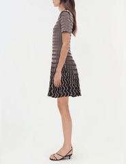 Simkhai Baylor Knit Mini Dress in cranberry multi with flared skirt and contrast trim side view