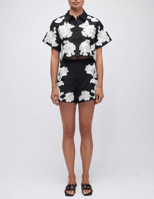 Front view of Simkhai Callie Embroidered Camp Shirt in black and white