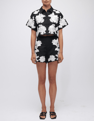 Front view of Simkhai Callie Embroidered Camp Shirt in black and white