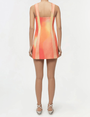 Simkhai sleeveless mini dress orange red sunset pattern fitted silhouette back view