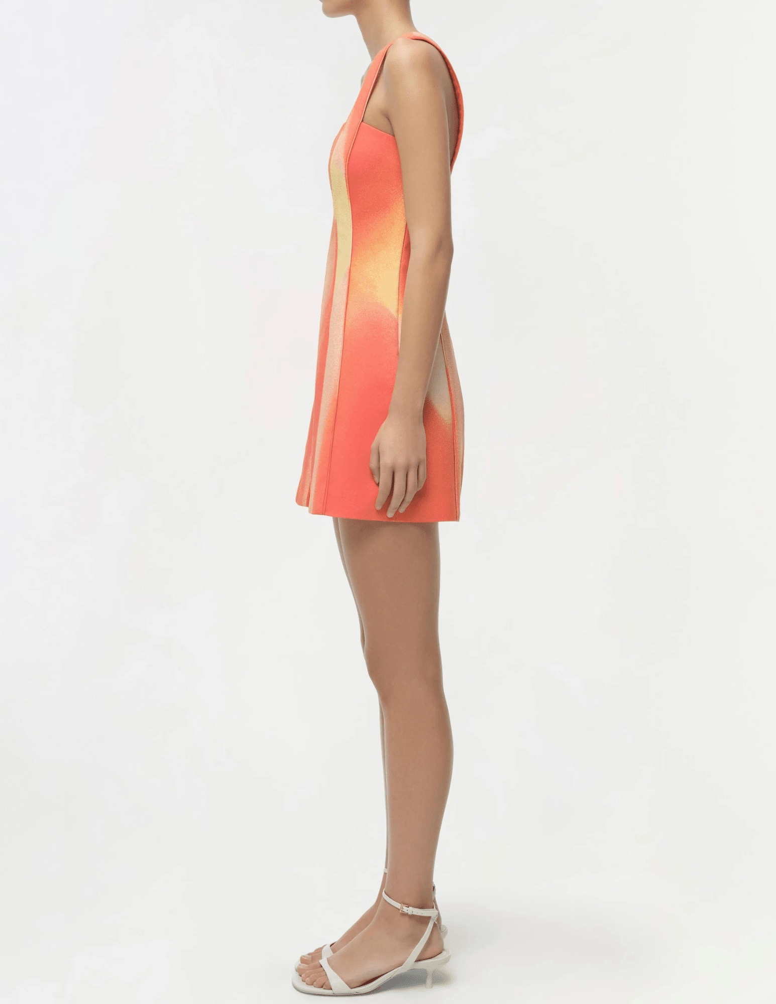 Simkhai sleeveless mini dress orange red sunset pattern fitted silhouette side view