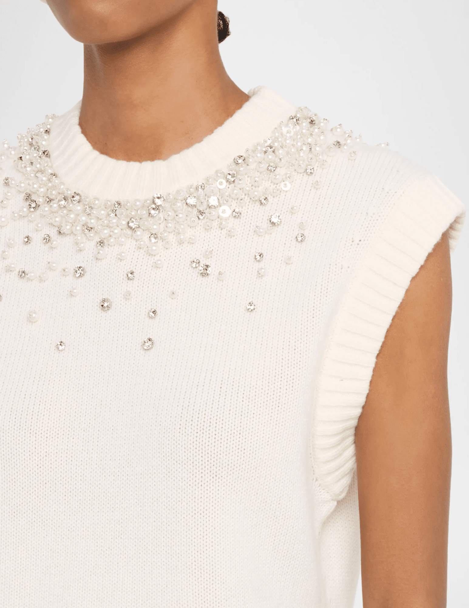 Close-up of pearl and rhinestone embellishments on SIMKHAI Candra Vest