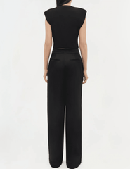 Back view of Simkhai black stretch jersey crop top