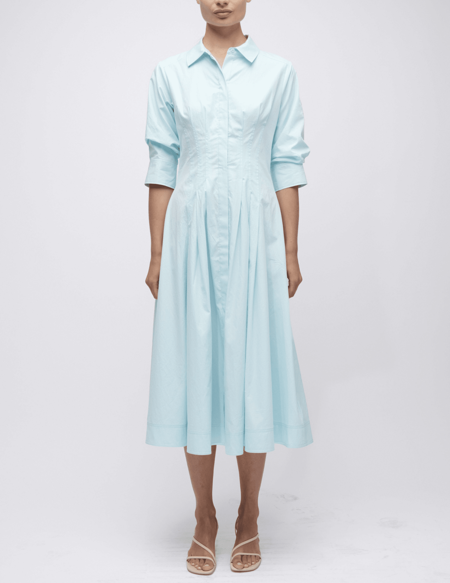 Front view of sky blue Simkhai midi dress with A-line shape