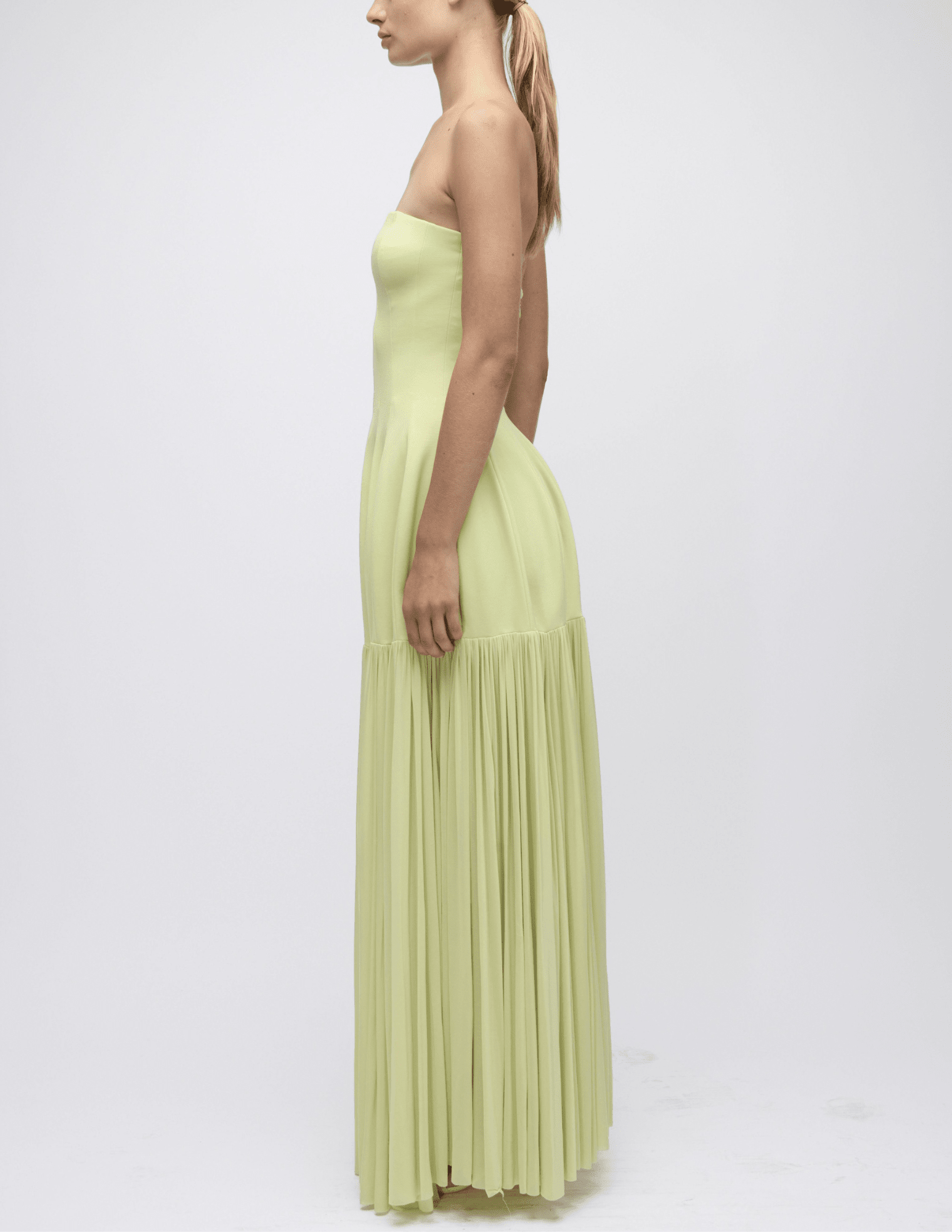 Side view of Simkhai Sandrine strapless maxi dress in celadon