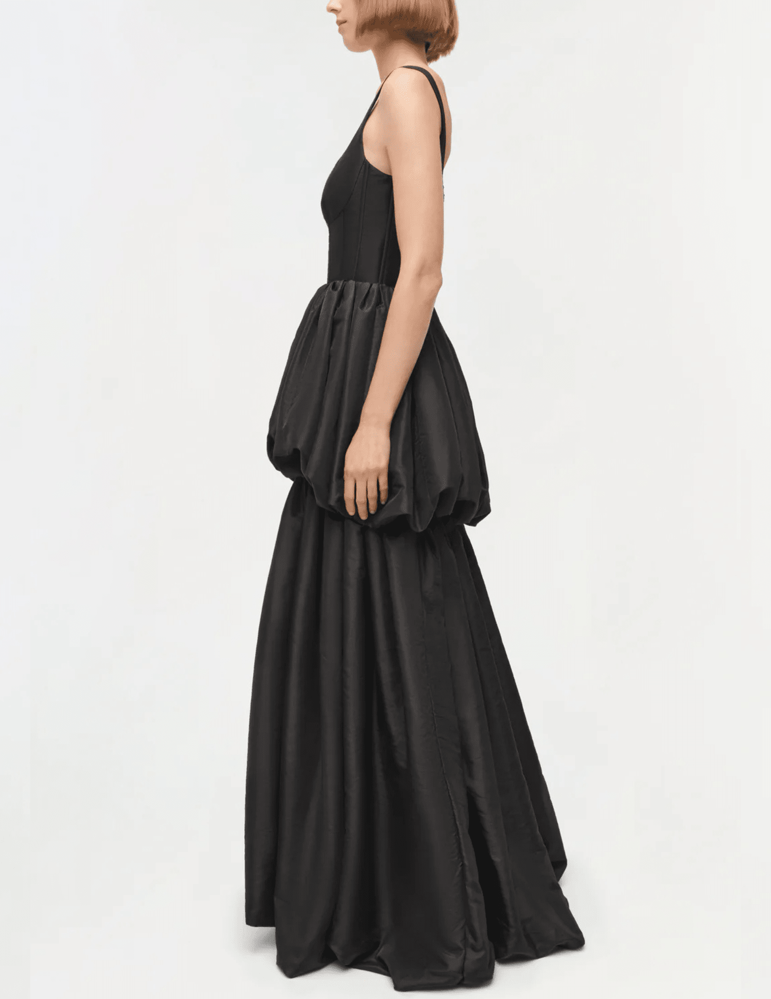 Side view of Simkhai Tabitha Double Bubble Gown in black