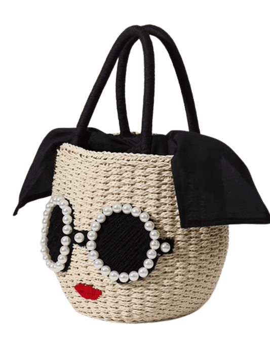 St. Barth Chloe Face straw basket tote bag in sand and black with pearl sunglasses applique side view