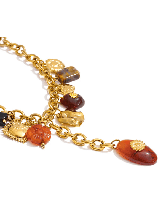 Women’s statement charm necklace with floral gold accents