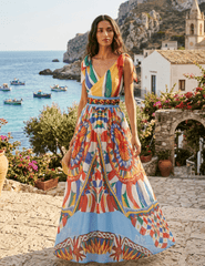 Model wearing the St. Barths La Robe Piper Maxi Dress in Faded Sicily Multi outdoors at a seaside destination