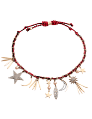Red cord and gold-tone chain necklace with pearl-accented charms