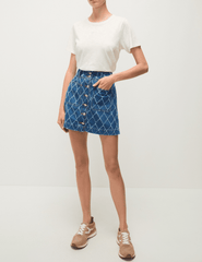Veronica Beard Moxie textured denim mini skirt in Blue Diamond, women’s stylish mini skirt with unique textured fabric and classic blue wash front model view
